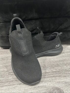 Skechers All-Black Slip-On Knit Sneakers